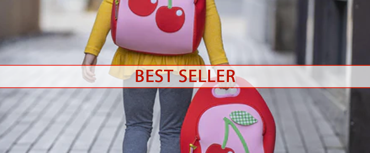 Girl carrying Dabbawalla machine washable red and pink Cherry Lunch bag and Backpack on her way home from school. Best Sellers