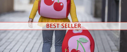  Girl carrying Dabbawalla machine washable red and pink Cherry Lunch bag and Backpack on her way home from school. 