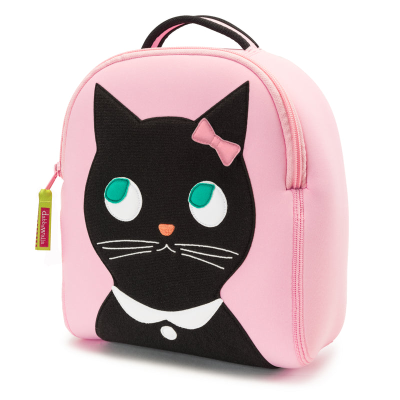 Miss Kitty Harness Backpack from Dabbawalla Bags. Cute black kitty is appliqued on the front panel of a light pink bag. Cute black kitty has jade wide eyes, a pink bow and white collar and charm. Removable leash attatches at the bottom of the bag.