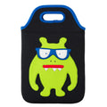 Green monster with snaggle teeth and blue eyeglasses sewn on the front of  the black tablet case by Dabbawalla Bags