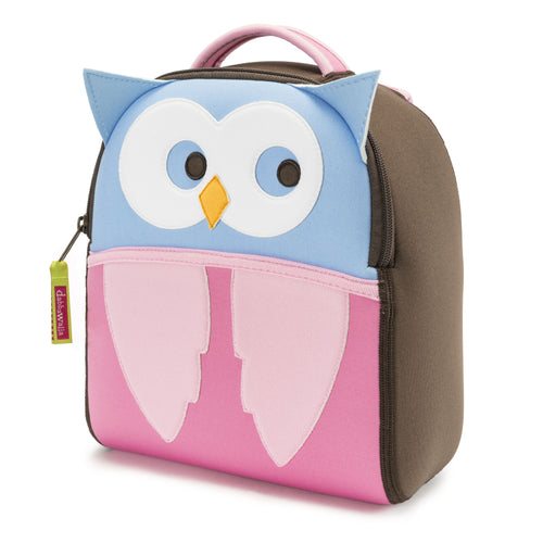 Light blue upper and pale pink lower form owl face and wings framed with brown side panels and pink top handle. Hoot Owl Harness Backpack has a removable tether that attaches at the bottom of the bag.